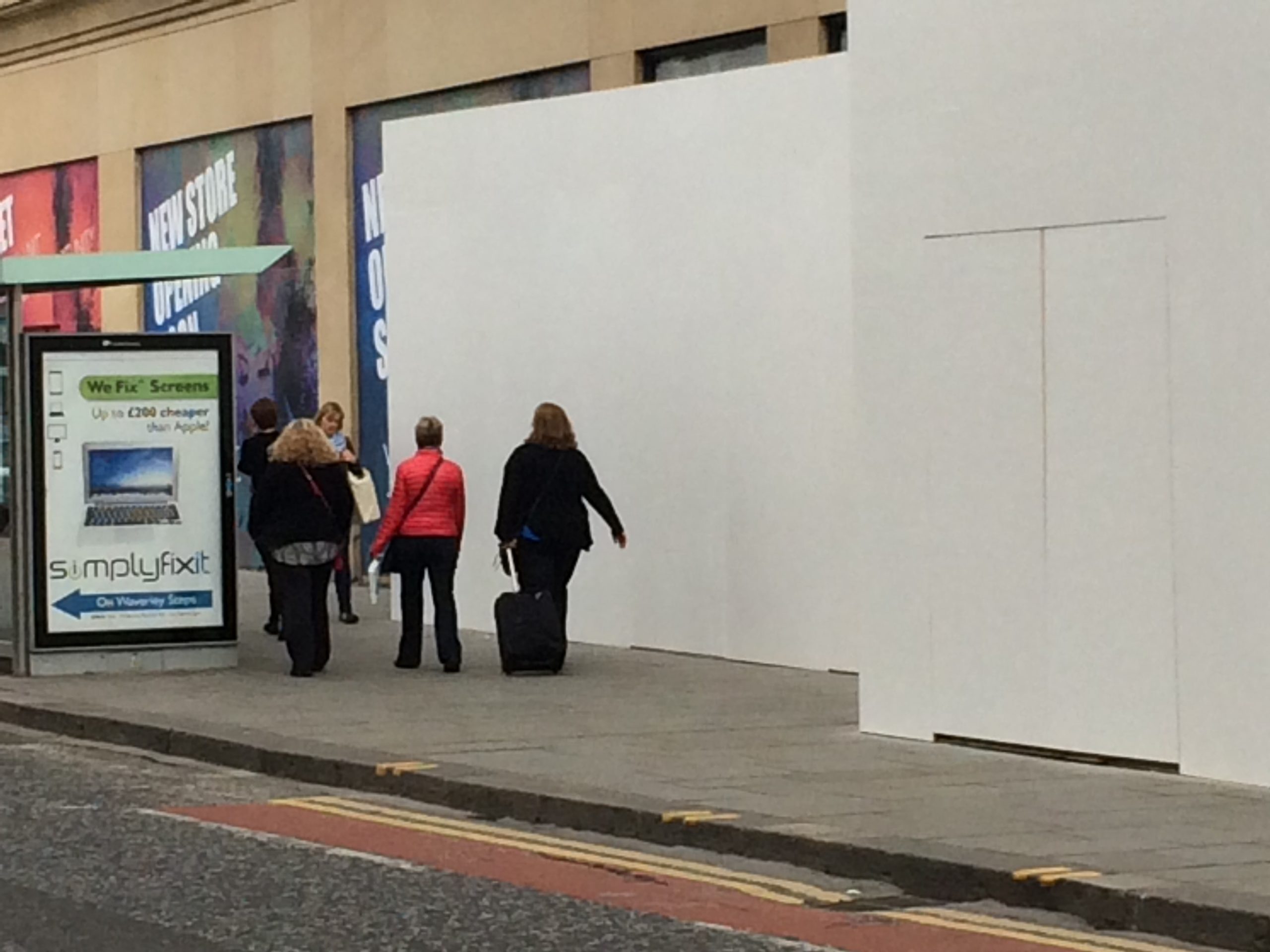 Image of the SimplyFixIt advert outside the Apple store on Princes Street Edinburgh