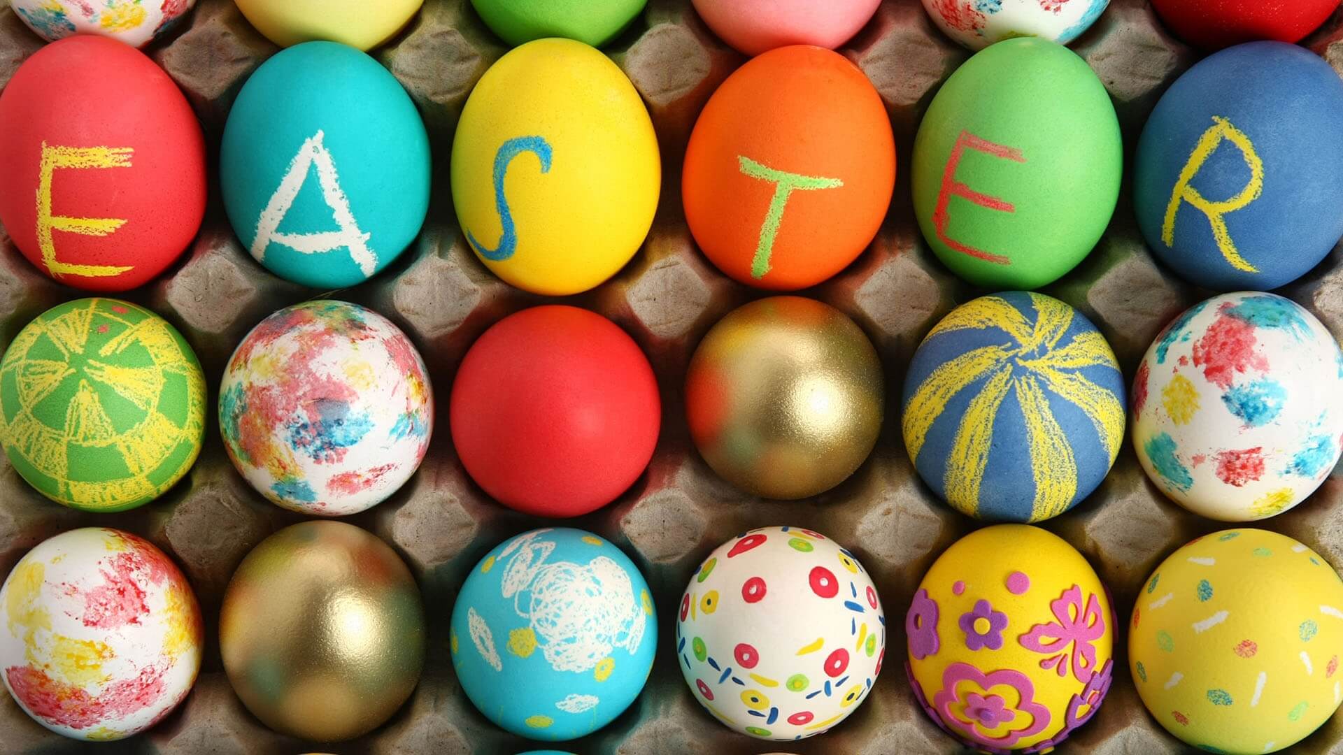 Some colourful eggs showing the message, Easter.